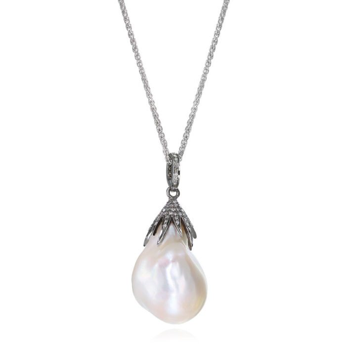 Diamond capped baroque pearl on sterling silver necklace